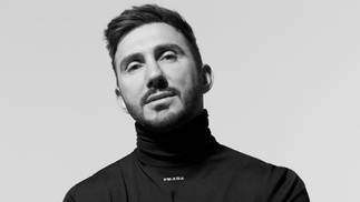 Black and white photo of Hot Since 82 wearing a black turtleneck jumper