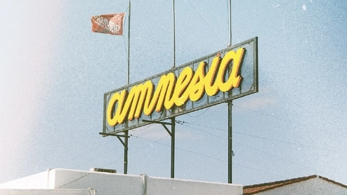 Photo of the big yellow sign on the roof of Amnesia Ibiza