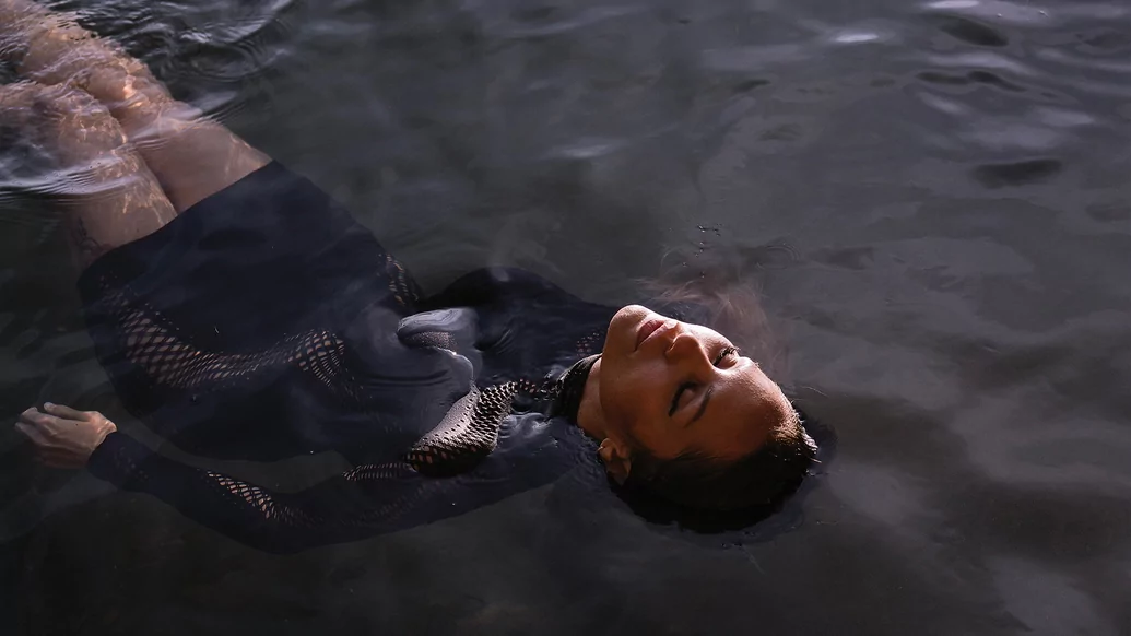 A photo of Deborah De Luca floating in the sea