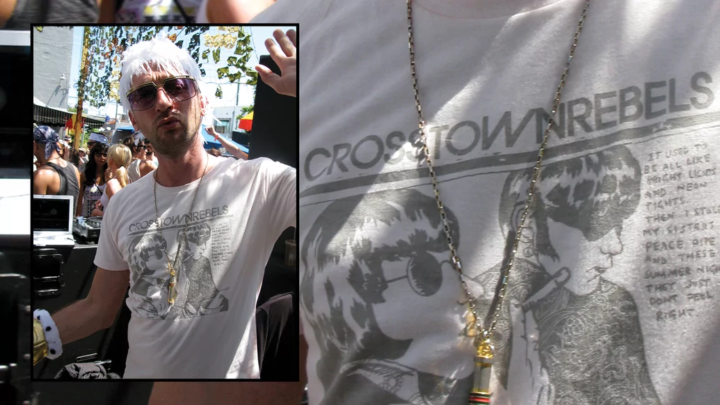 Photo of Damian Lazarus wearing a white Crosstown Rebels t-shirt and a white wig 