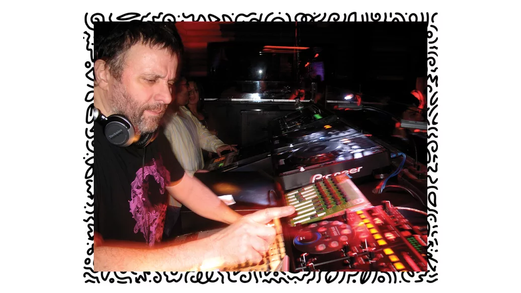 Photo of François K DJing in a club on a white background