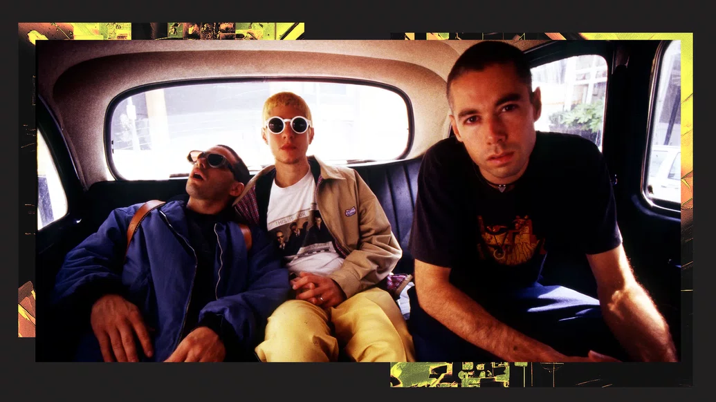 Photo of Beastie Boys in 1994 sitting in the back of a car