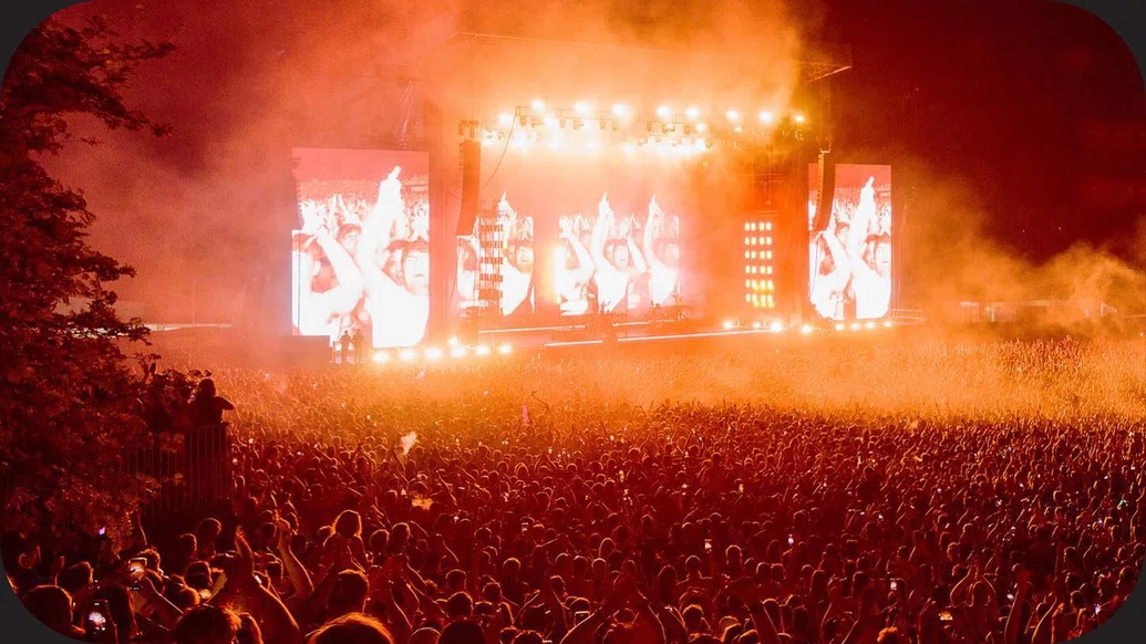 Photo of a huge crowd dancing beneath the main stage at Parklife Festival