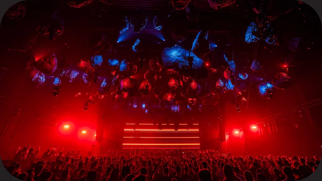 Photo of a blue and red-lit stage at Time Warp, Germany