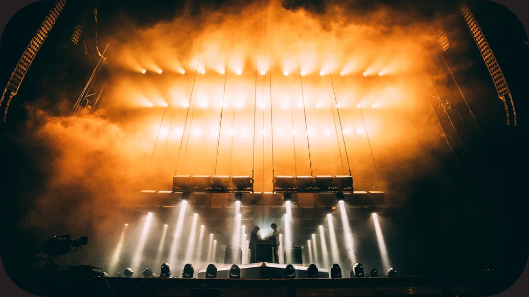 Atmospheric photo of the main stage at Primavera Sound with an orange light scene