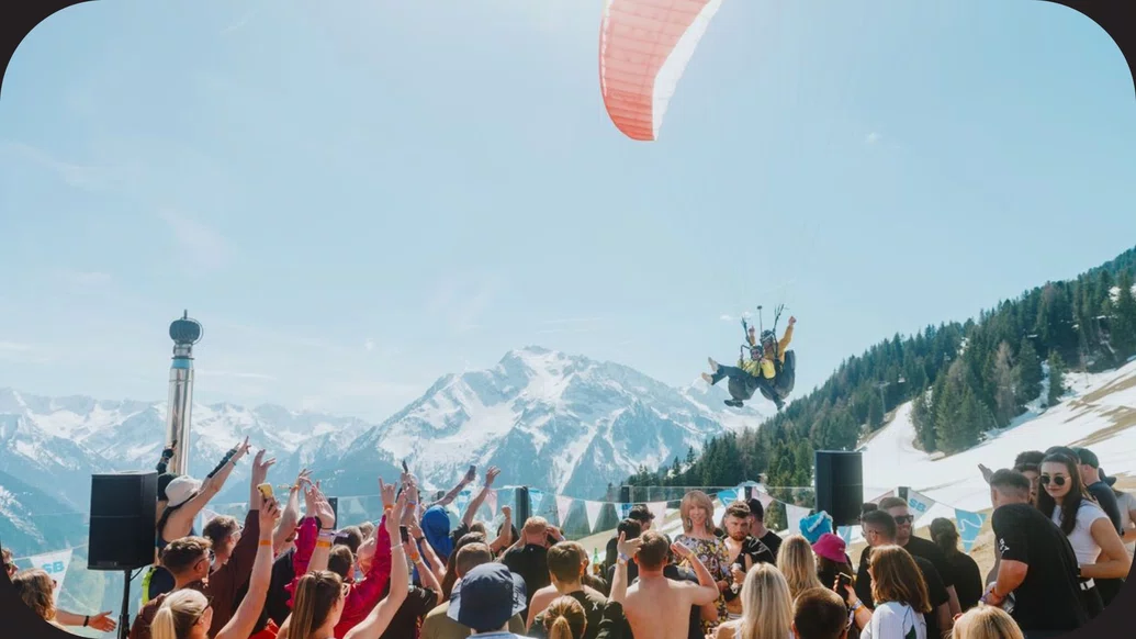 Photo of people dancing on the slopes at Snowbombing 