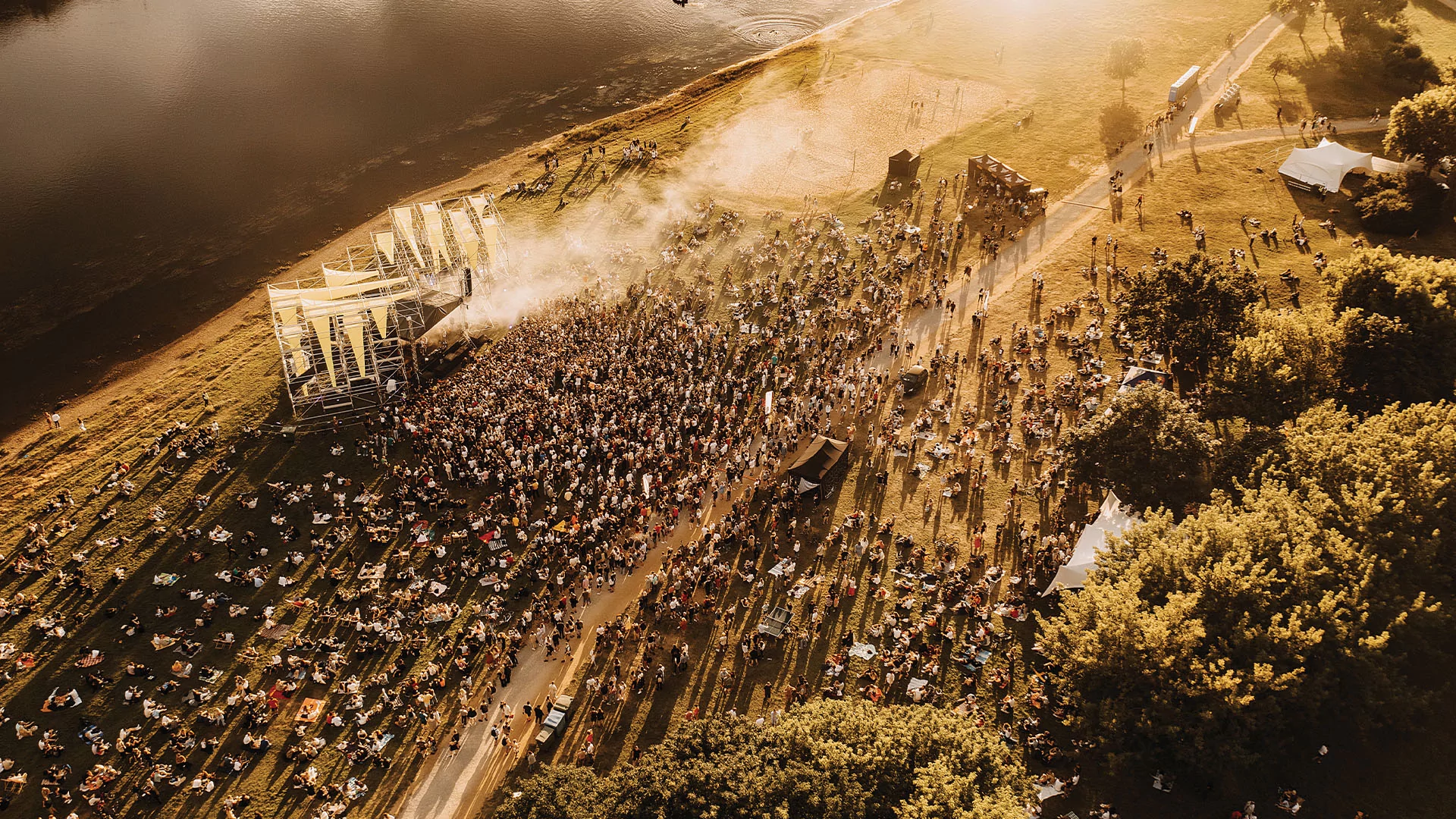 Ariel shot of the crowd outside at AUDRA festival at dusk
