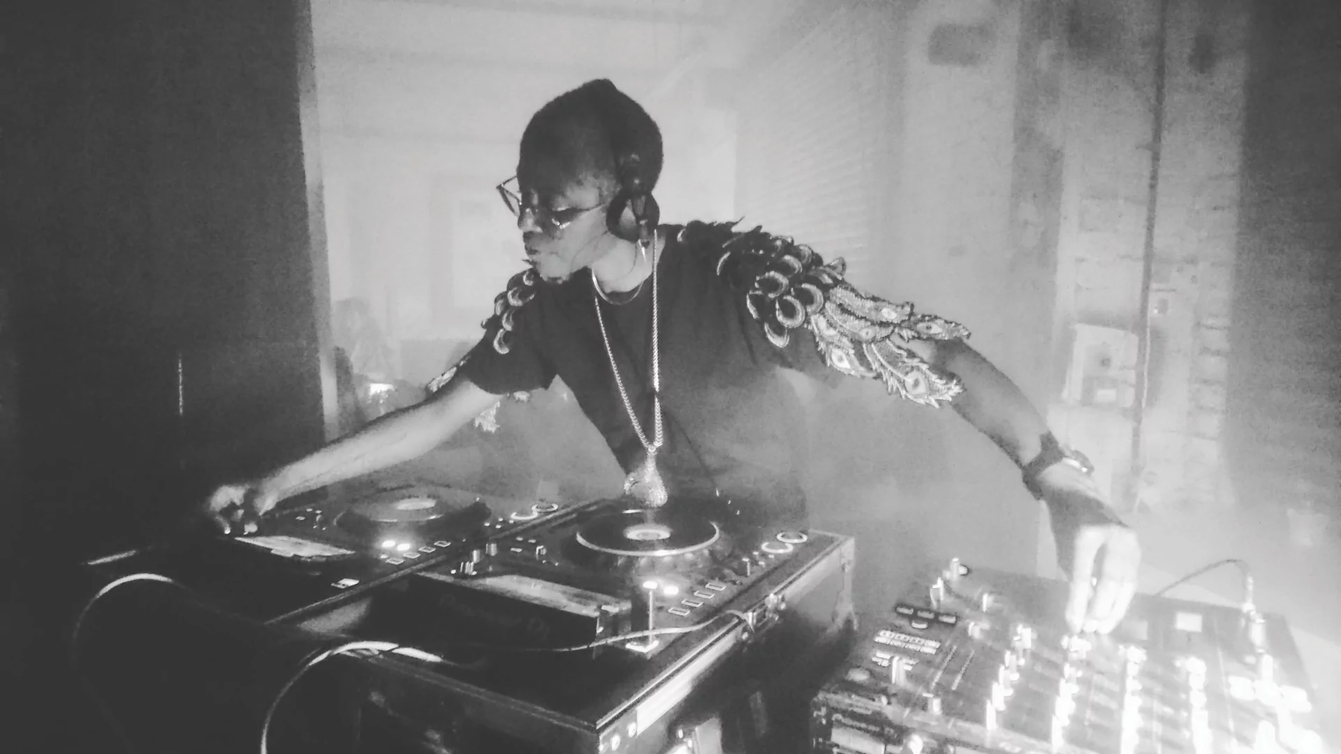 DJ Paulette black and white photo of DJing