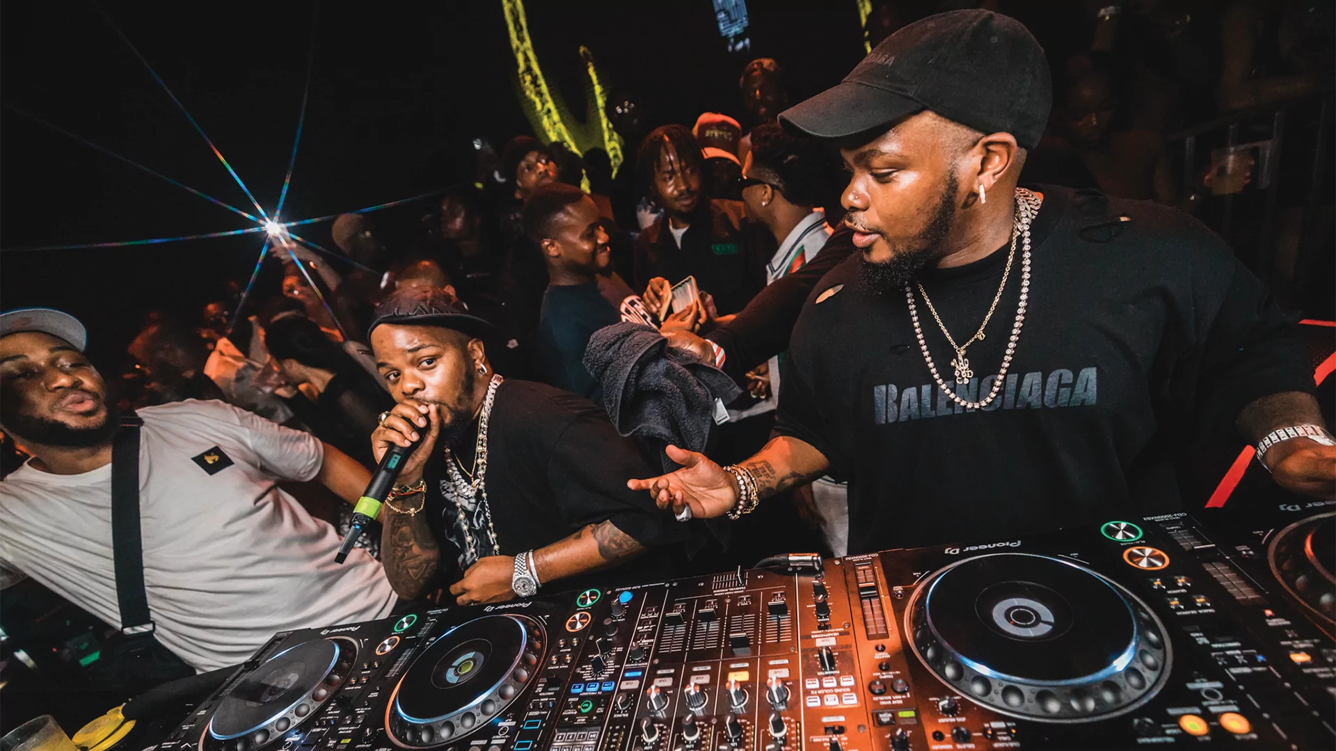 Photo of Major League Djz performing behind the decks in a busy club