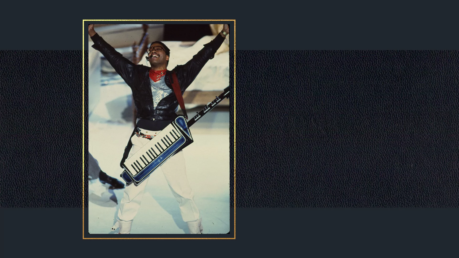 Photo of Herbie Hancock performing live with his Keytar in 1984
