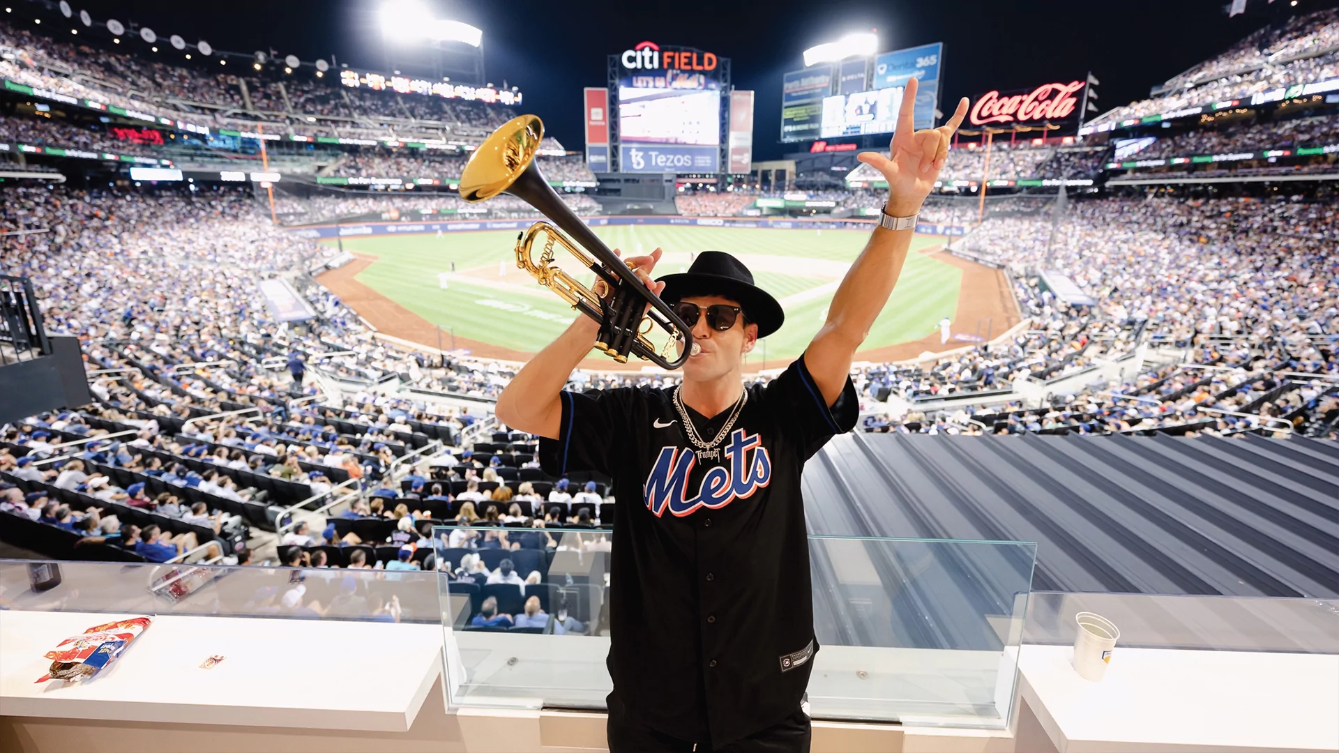 Photo of Jimmy Trumpet playing his trumpet at a New York Mets game