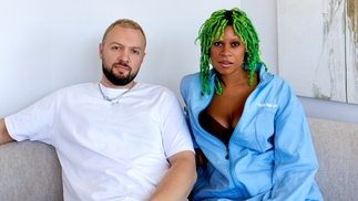 Chris Lake wears a white t-shirt and Aluna wears a blue boilersuit in a press image