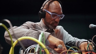 King Britt is pictured using analogue synths