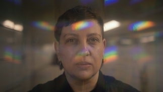 Photo of Alinka with refracted rainbows on her face