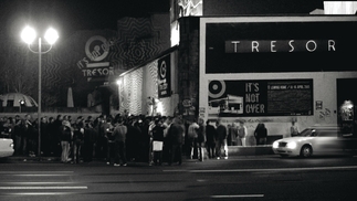 Black and white photo of a queue of people outside Tresor, Berlin