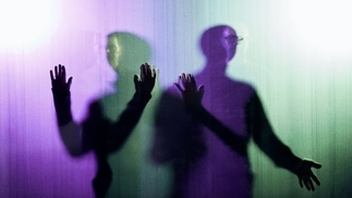 Green and purple shadowy image of the Chemical Brothers