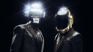 Photo of the two members of Daft Punk wearing their signature helmets