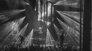 Black and white photo of Faithless playing live at The Roundhouse in London