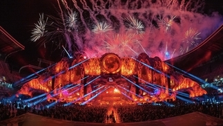 Photo of the main arena at UNTOLD with pink and purple fireworks