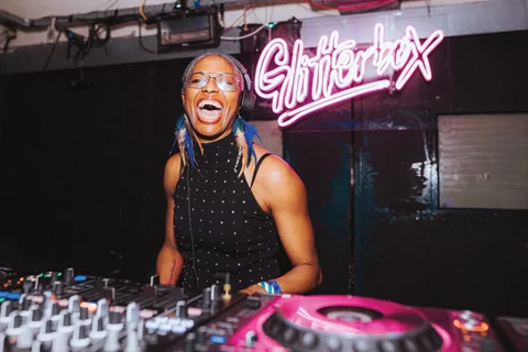 DJ Paulette DJing at Glitterbox