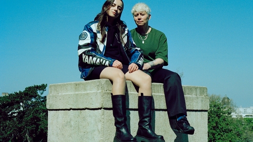Lou Fauroux (left) and Jennifer Cardini (right) of Færies Records sit atop a plinth