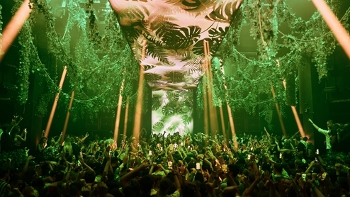 Black Coffee performing at Hï Ibiza’s opening party 2023 in a jungle-themed room