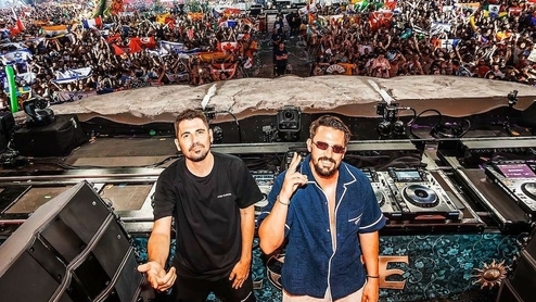 Dimitri Vegas & Like Mike in front of the Mainstage crowd at Tomorrowland 2024