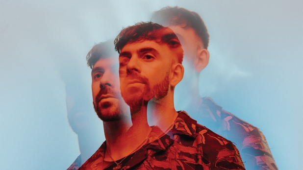 Patrick Topping in a shirt on a blue background
