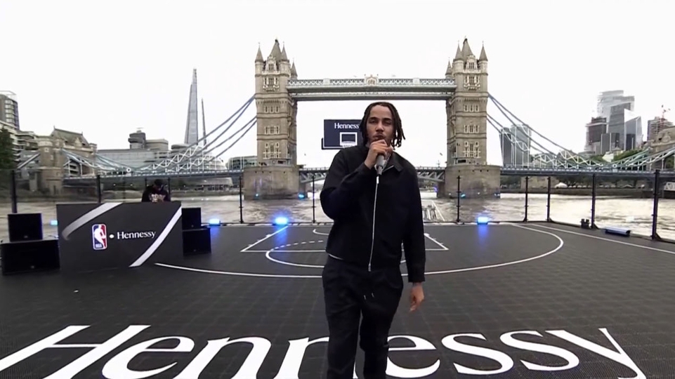 Watch AJ Tracey perform on floating basketball court on the Thames