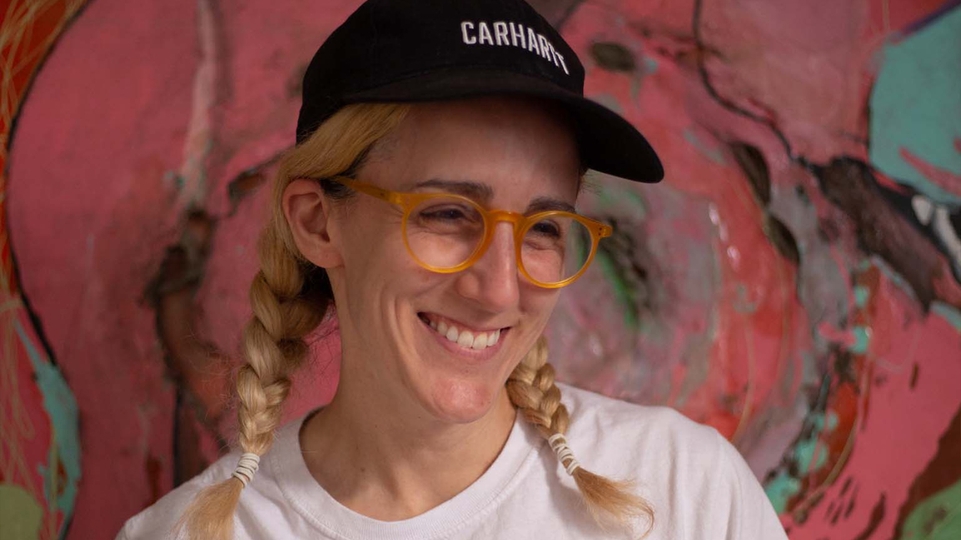 Lauren Flax smiling Carhartt hat