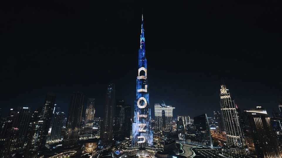 Burj Khalifa lit up with the UNTOLD logo