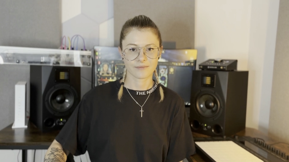 A.Fruit in the studio wearing a black t-shirt and glasses