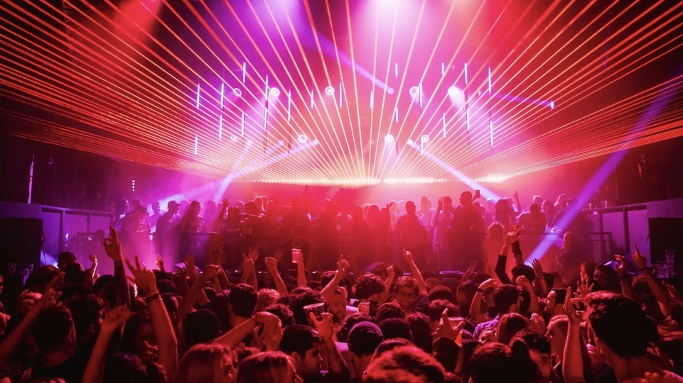 Photo of a crowd dancing at KOKO Electronic with pink and purple strobe lights