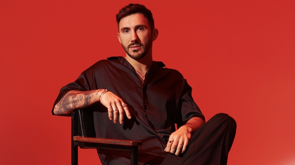 Photo of Hot Since 82 sitting in a chair 