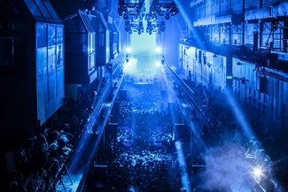 Ariel shot of Deadmau5 playing at Printworks under blue lights